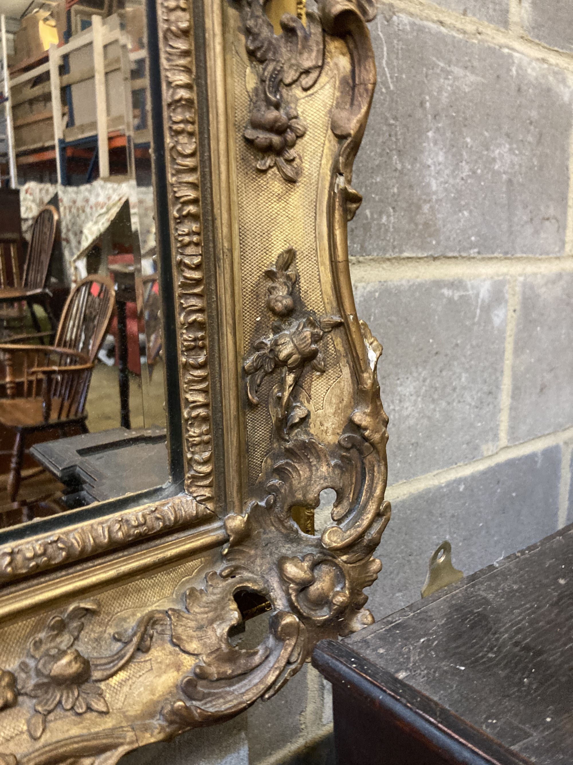 A Victorian rectangular giltwood and gesso frame (now as a wall mirror) width 53cm, height 69cm